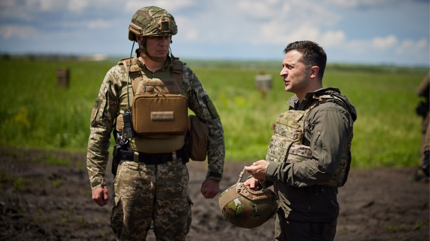 Ukrainian President Volodymyr Zelensky visits soldiers at the frontline in Donbas, Ukraine in June 2021.