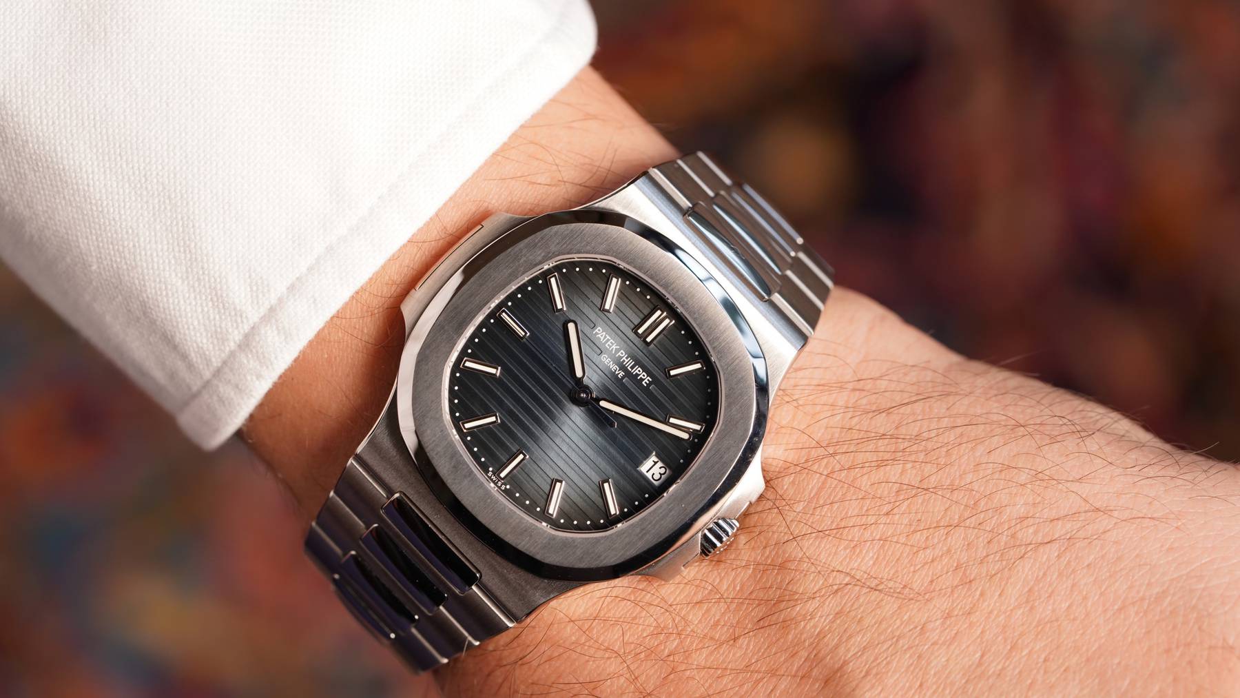 A The Patek Philippe Nautilus 5711/1A watch on a wrist.