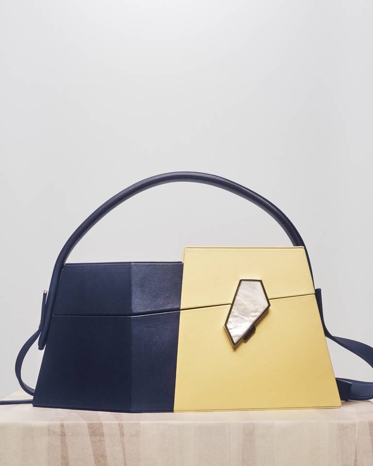 Asymmetrical bag with mother of pearl detail from Steven Ma. Casper Sejersen.