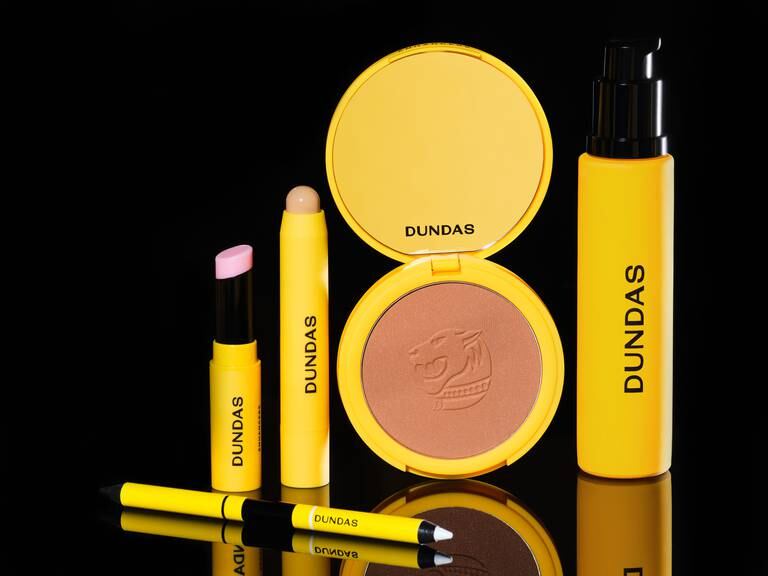 All five products with yellow packaging and black logo.