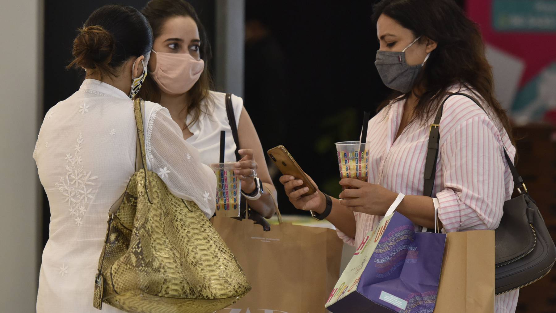 People shopping at Select City Walk Mall at Saket after further ease in the COVID-19 lockdown on June 7, 2021 in New Delhi, India. Getty Images.