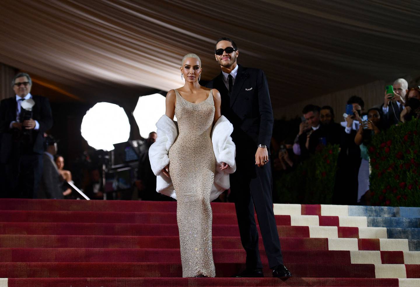 Kim Kardashian arrives to The Met Gala in a dress famously worn by Marilyn Monroe.