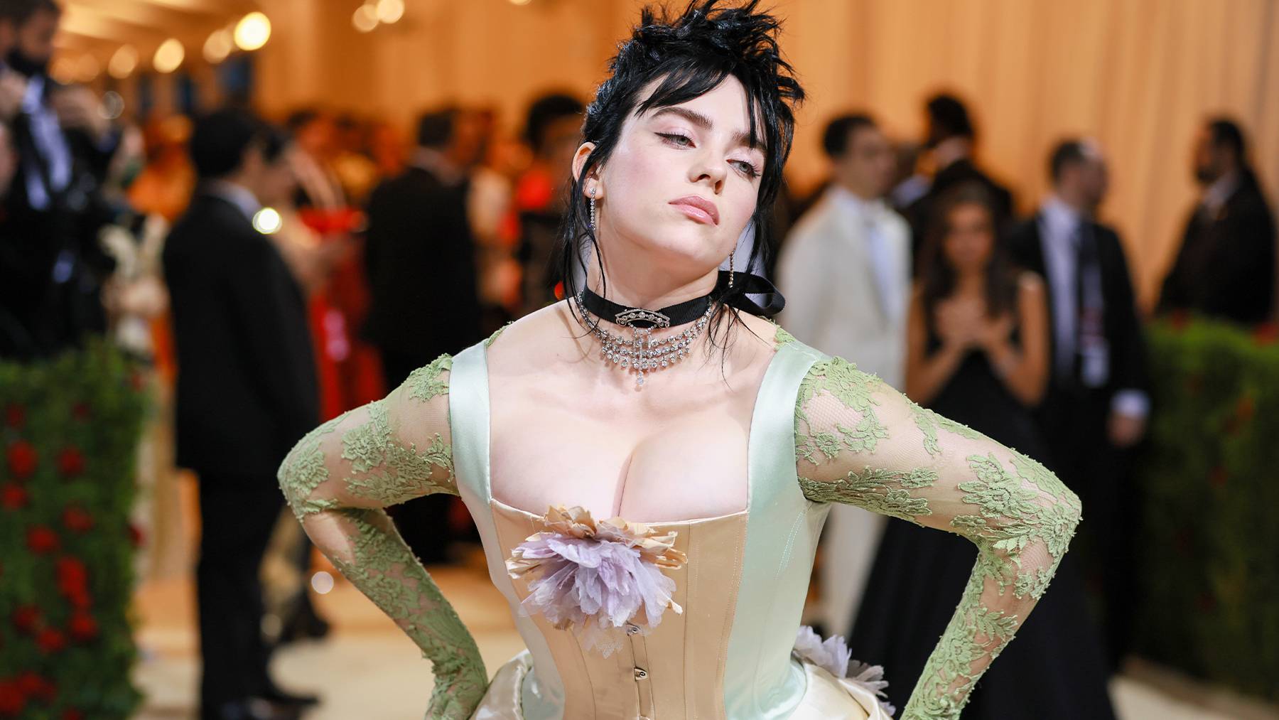 Billie Eilish attends The 2022 Met Gala in a Gucci corset made from deadstock materials.