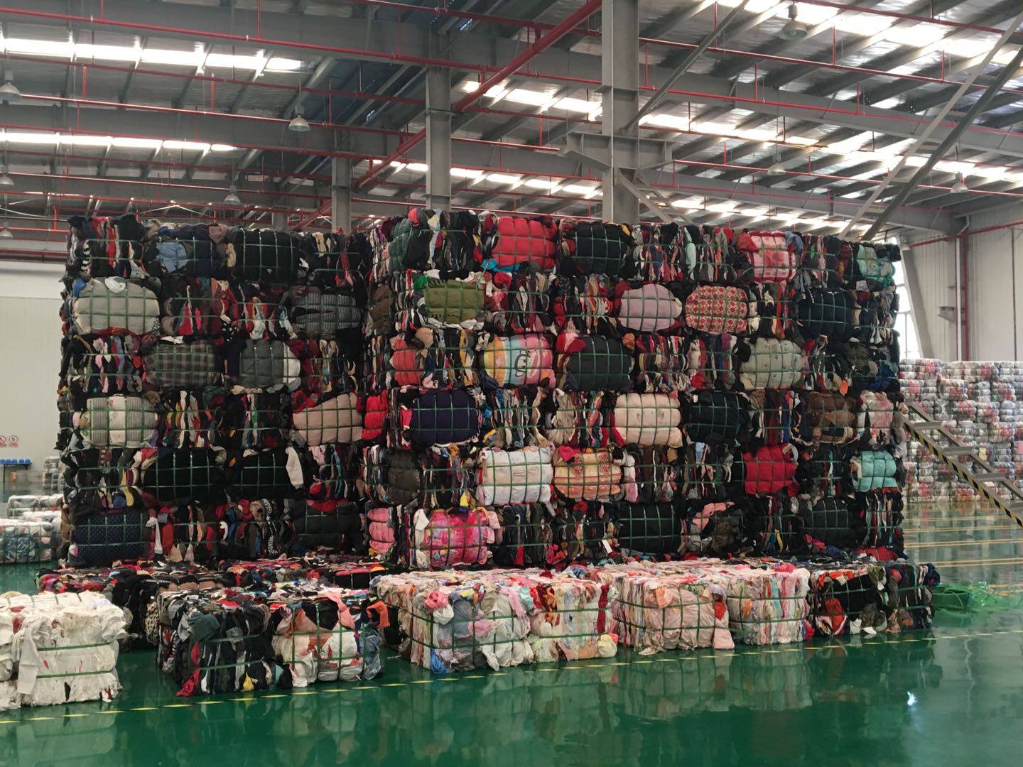 Donated clothes at a Fei Mayi warehouse. Fei Mayi