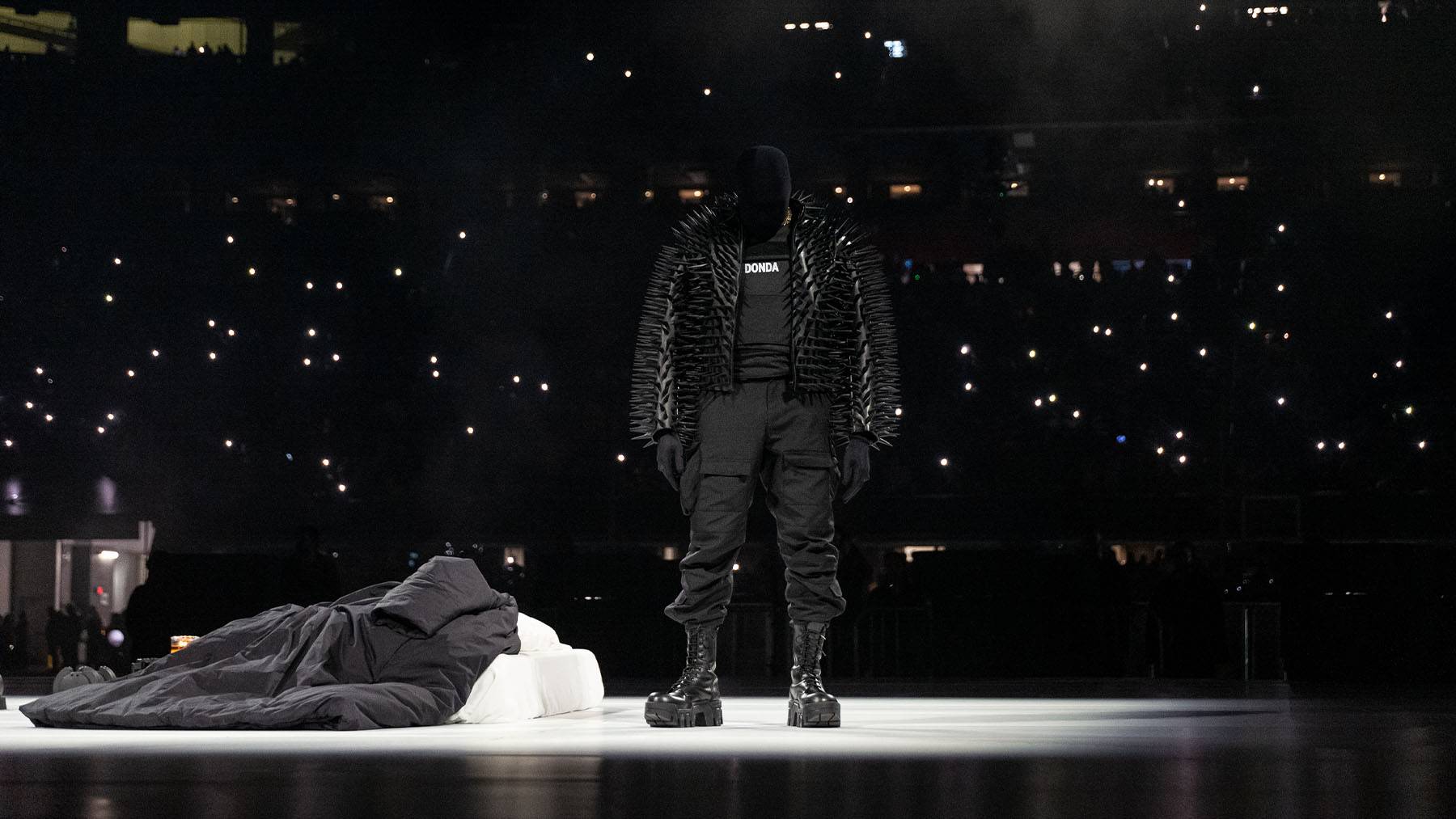 Kanye West on stage for his show in collaboration with Demna Gvasalia of Balenciaga. Courtesy.
