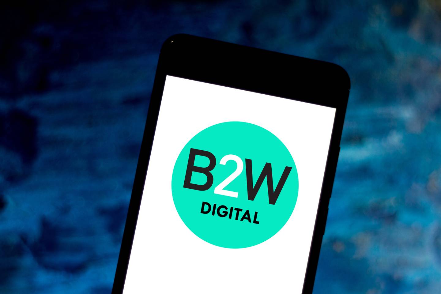 The B2W logo displayed on a smartphone. Shutterstock