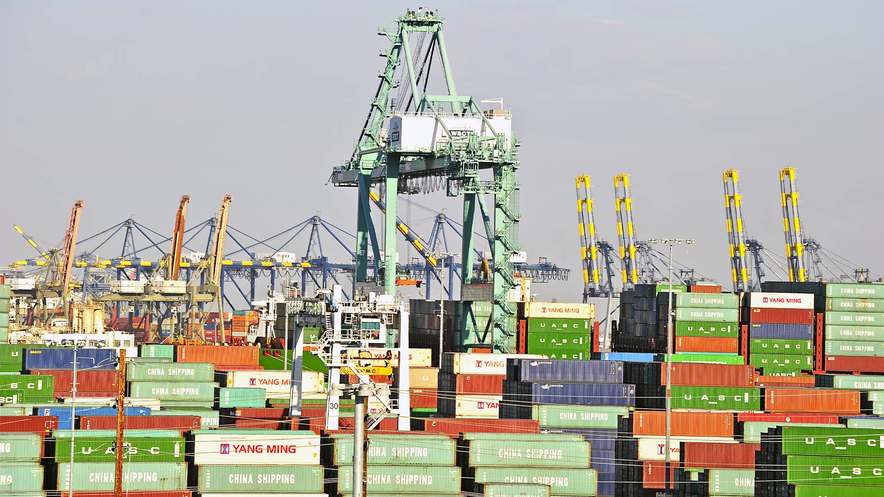 Port containers in green, blue and red.