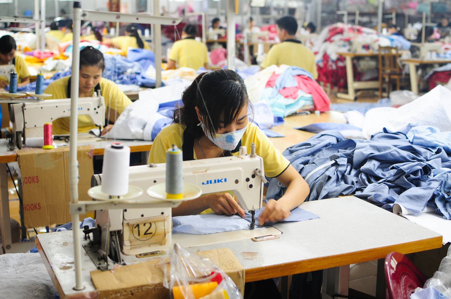 Workers in a Vietnamese garment factory. Shutterstock