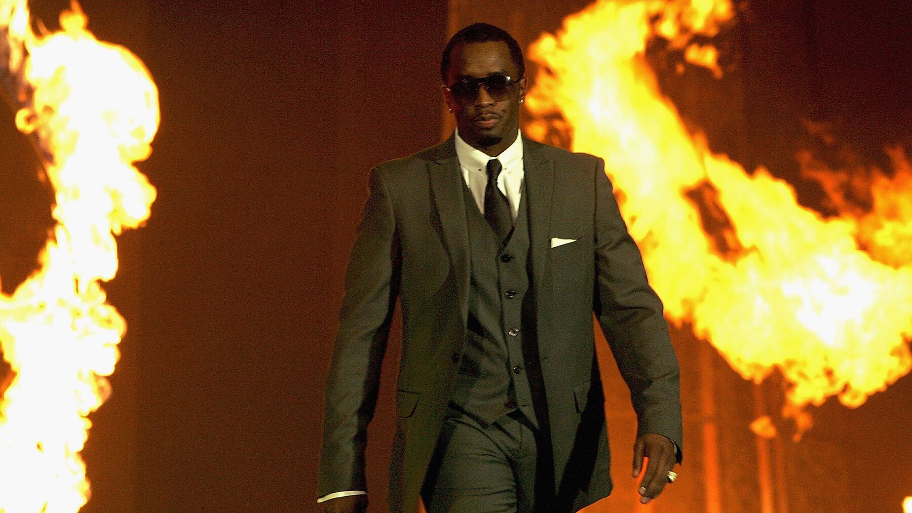 Musician and designer Sean Combs on stage at a fashion show on September 28, 2006.