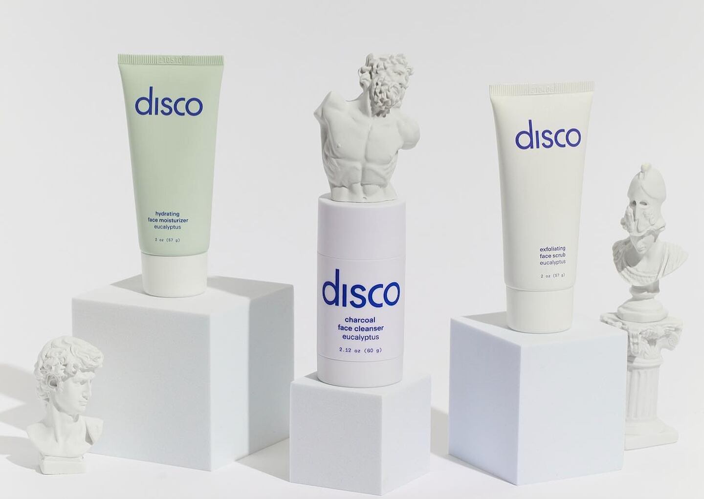 An image of skincare products arranged on small blocks.