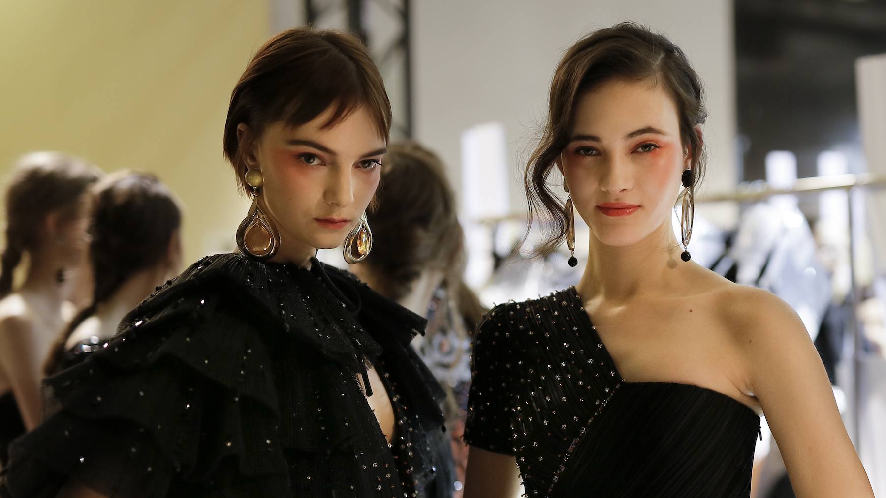 Models backstage at Giorgio Armani Privé haute couture show at Paris Fashion Week SS 2017. L'Oréal has licensed Armani's beauty line since 1988.