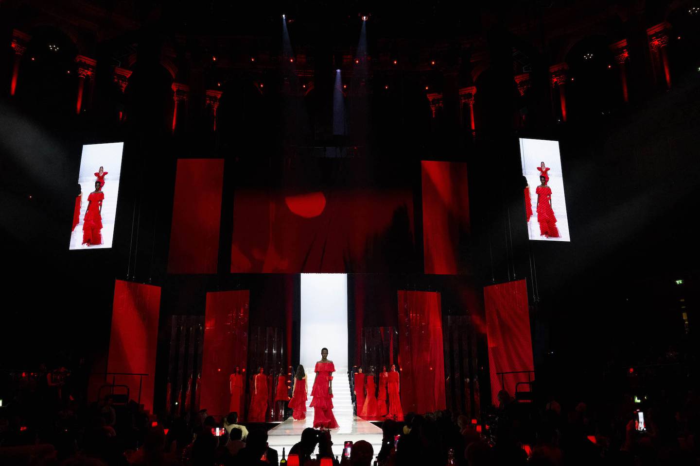 To close the ceremony, models walked the stage wearing red gowns designed by Valentino Garavani.