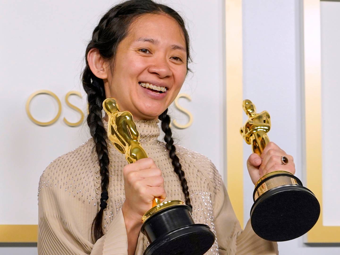 LOS ANGELES, CALIFORNIA - APRIL 25: Director/Producer Chloe Zhao, winner of Best Directing and Best Picture for "Nomadland," poses in the press room at the Oscars on Sunday, April 25, 2021. Getty Images.