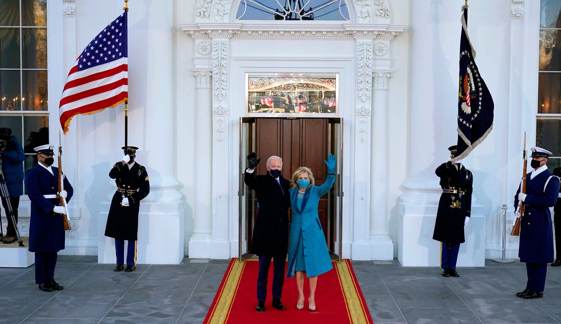 US President Joe Biden and US First Lady Jill Biden wave as they arrive at the White House. Alex Brandon AFP via Getty Images