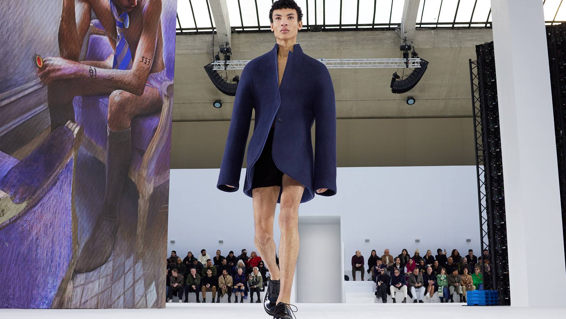 A model walks the runway at Loewe's Autumn/Winter 2023 menswear show in Paris.