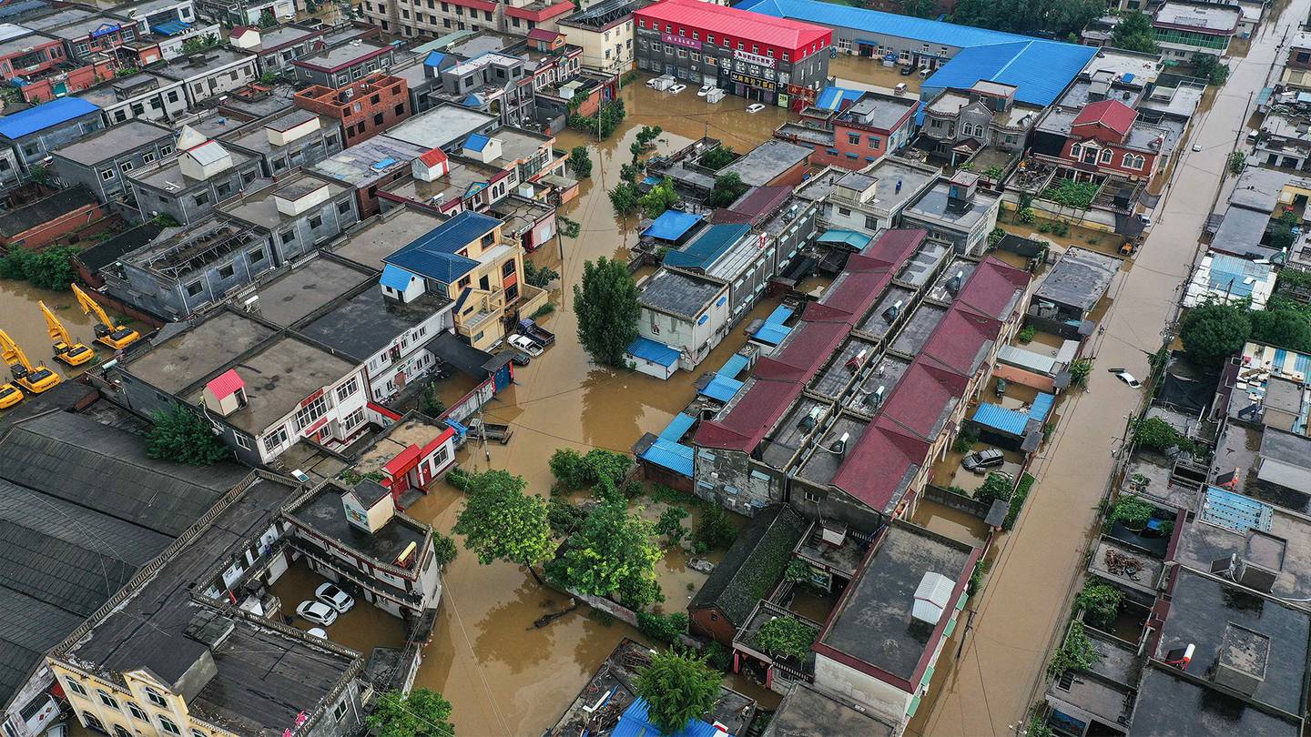 Flooded buildings and streets following heavy rains in Xinxiang, in China's central Henan province. Getty Images.