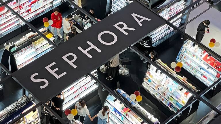 Customers shop for cosmetic products at a Sephora store in Beijing, China. Getty Images.