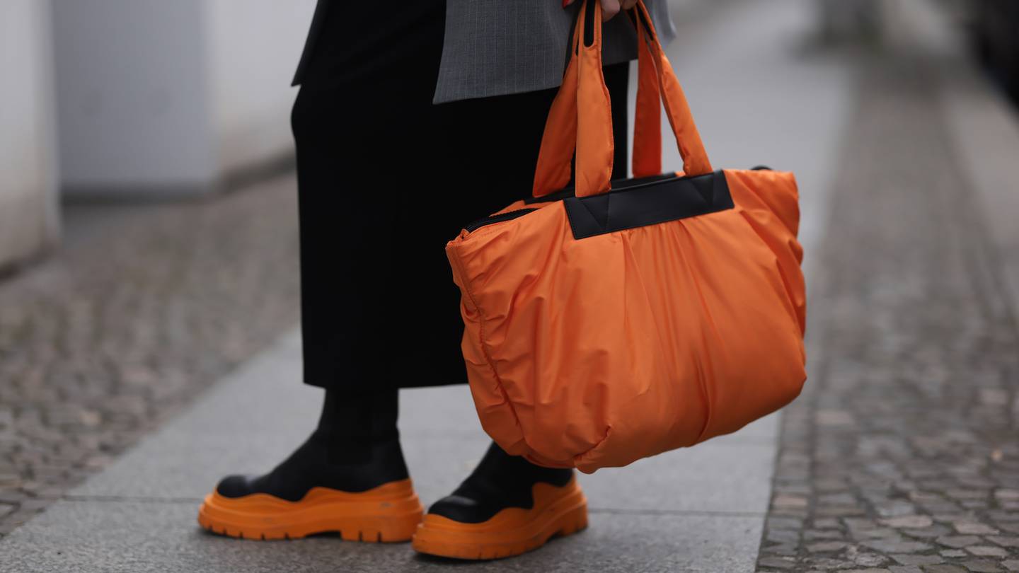 The VeeCollective orange nylon shopper bag.