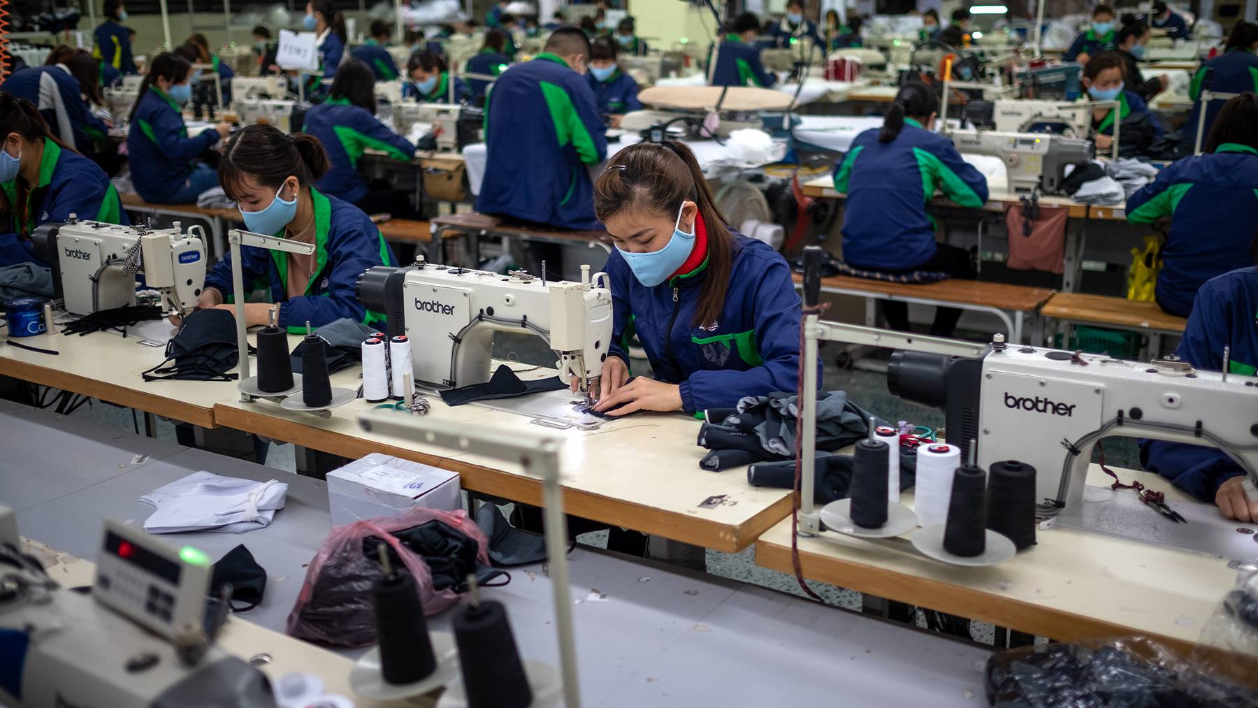 In early 2021, garment factories in Vietnam pivoted to making masks. But now, amid an overwhelming uptick in Covid-19 cases, factories have been shut altogether. Getty Images.