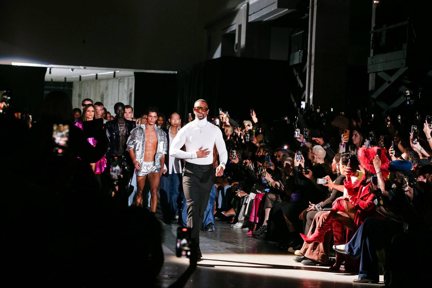 LaQuan Smith greets the crowd at the end of his Spring/Summer 2024 New York Fashion Week show.