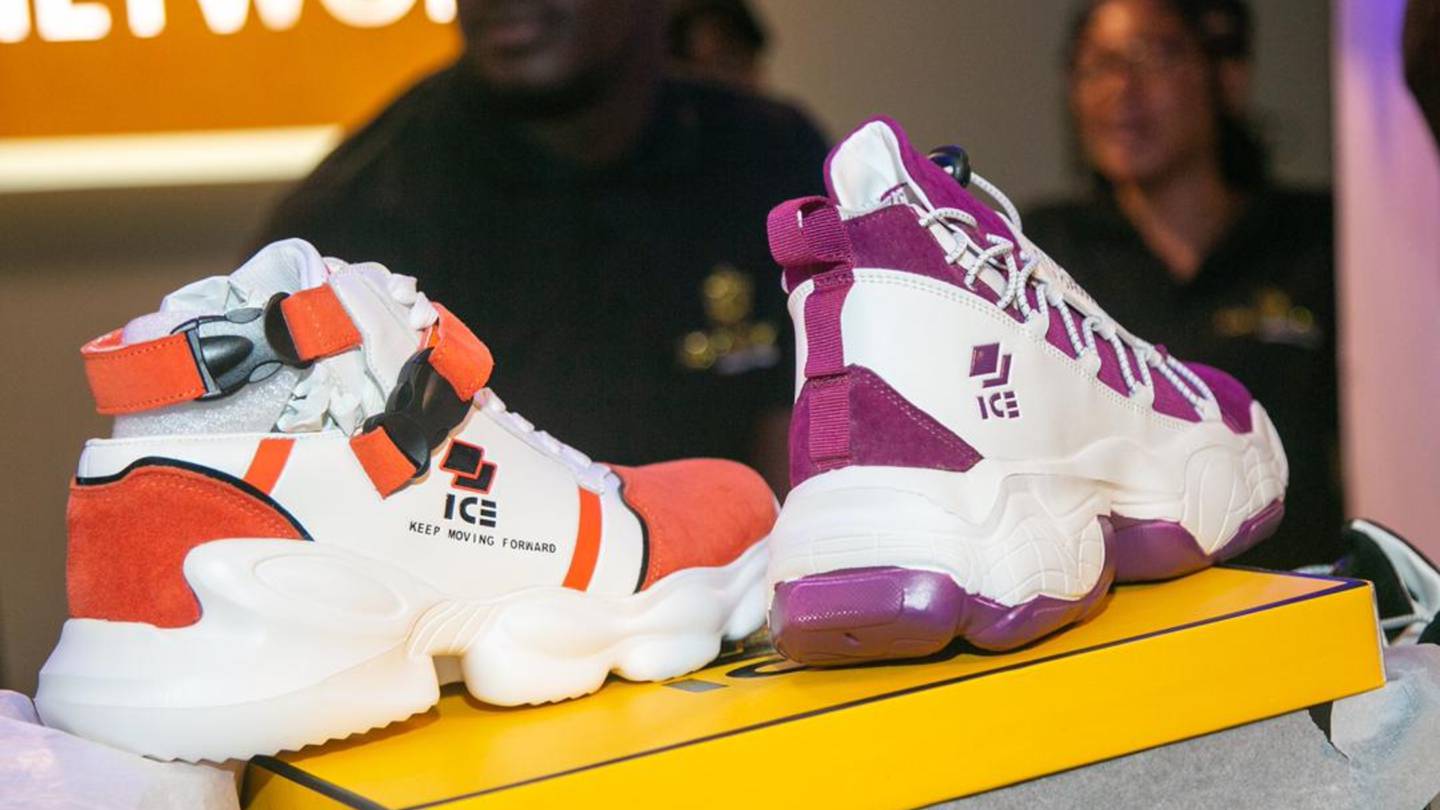 The "orange" and "oxblood" colourways of Ayissi William's Cameroonian sneaker start-up, Ice.