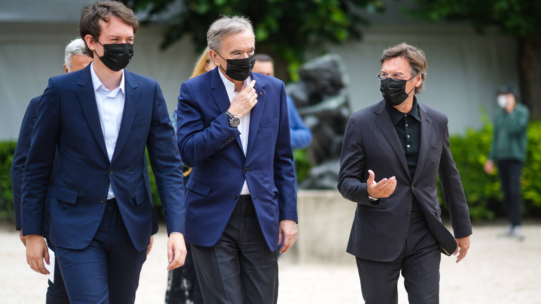 LVMH chairman Bernard Arnault arrives at Dior’s haute couture show with his son Frédéric and the brand’s CEO Pietro Beccari.