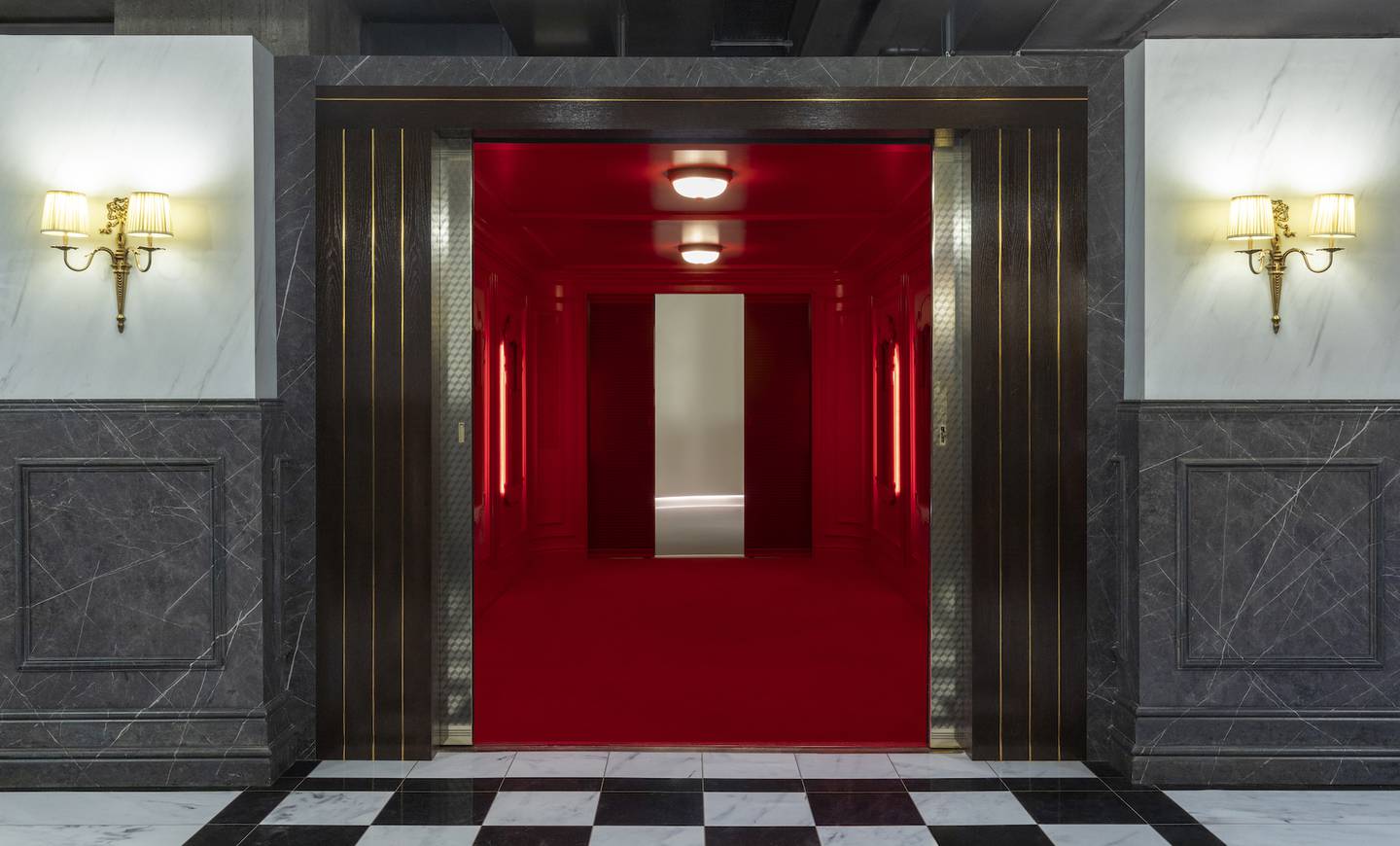 The “red ascending room” is a recreation of the first electric elevator at the Savoy Hotel, where Gucci founder Guccio Gucci worked as a teenager.