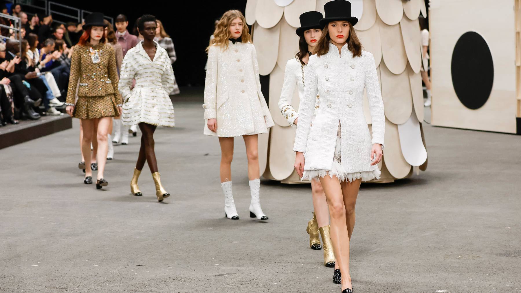 Models walk the runway at Chanel's Haute Couture show in Paris.