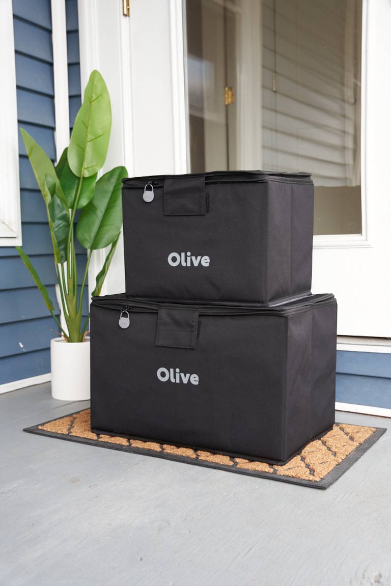 Olive consolidates customers' e-commerce orders for delivery in reusable totes