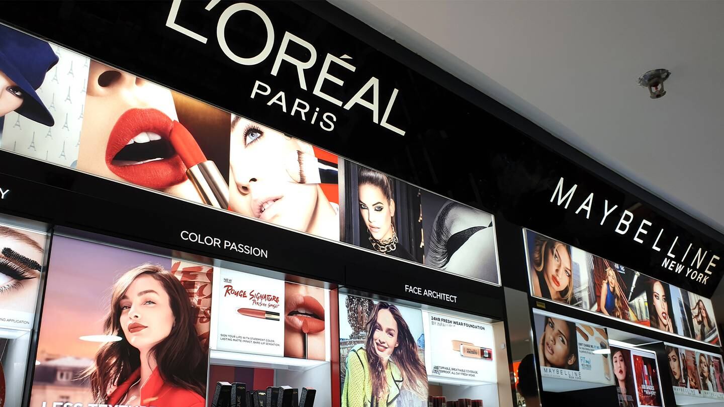 L'Oréal and Maybelline cosmetics store in shopping mall. Shutterstock.