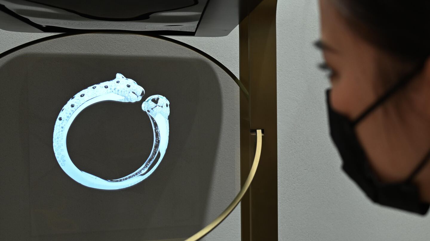 A visitor looks at a ring with 3D technology at the Cartier stand during the 3rd China International Import Expo (CIIE) at the National Exhibition and Convention Center in Shanghai, China. Getty Images.