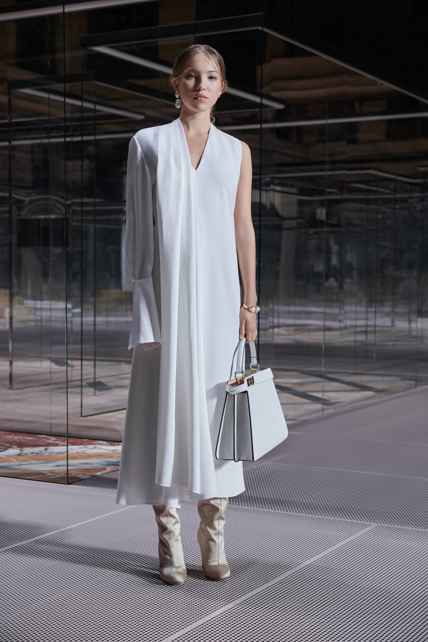 A look from Kim Jones’ first retail collection for Fendi, a limited-edition capsule that translates his Spring/Summer 2021 Couture debut into ready-to-wear. Fendi.