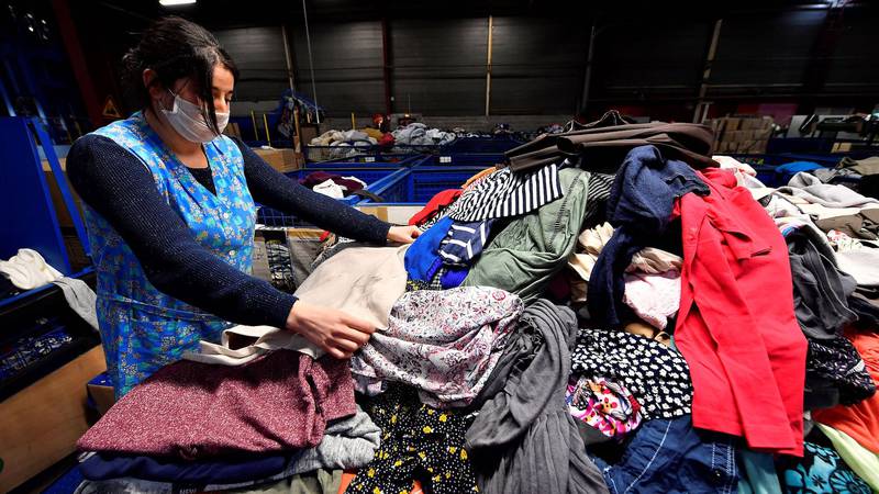 Big Brands Are Taking Back Unwanted Clothes. Where Do They Go?