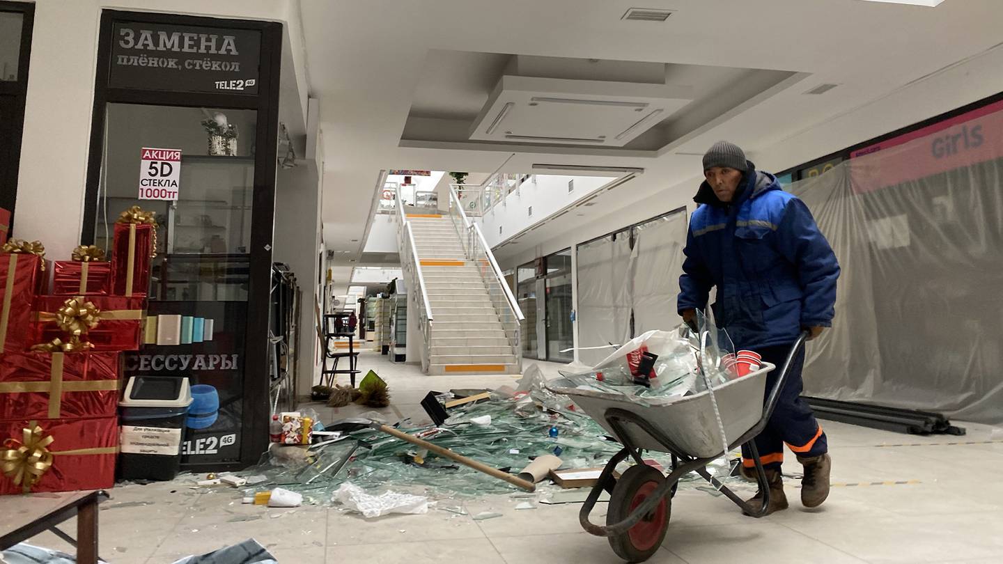 Damaged stores in a shopping mall following protests in Almaty, Kazakhstan.
