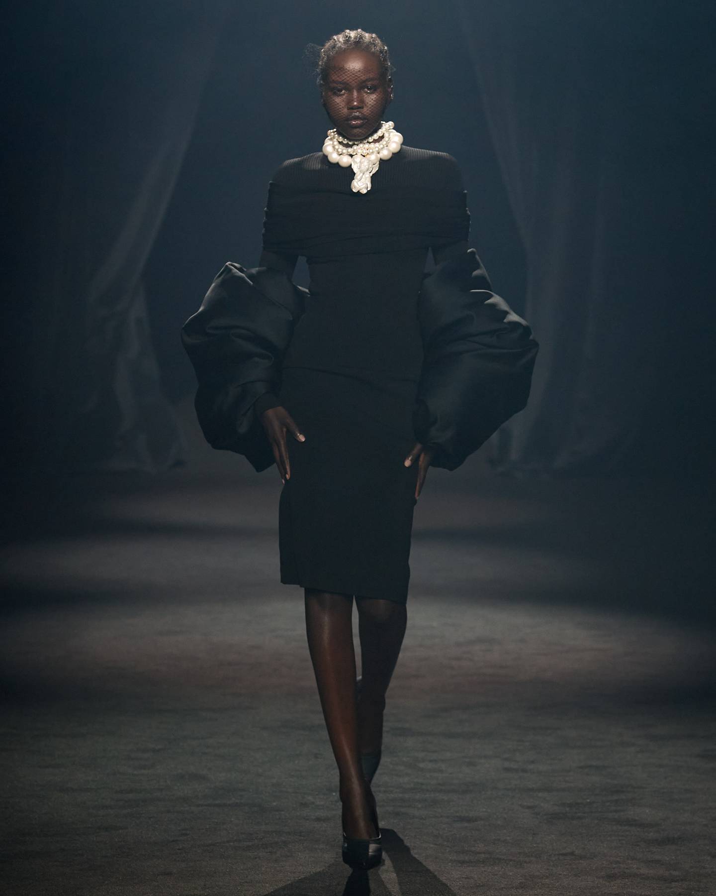 A model walks the runway during the Alber Elbaz tribute show as part of Paris Fashion Week. Courtesy.
