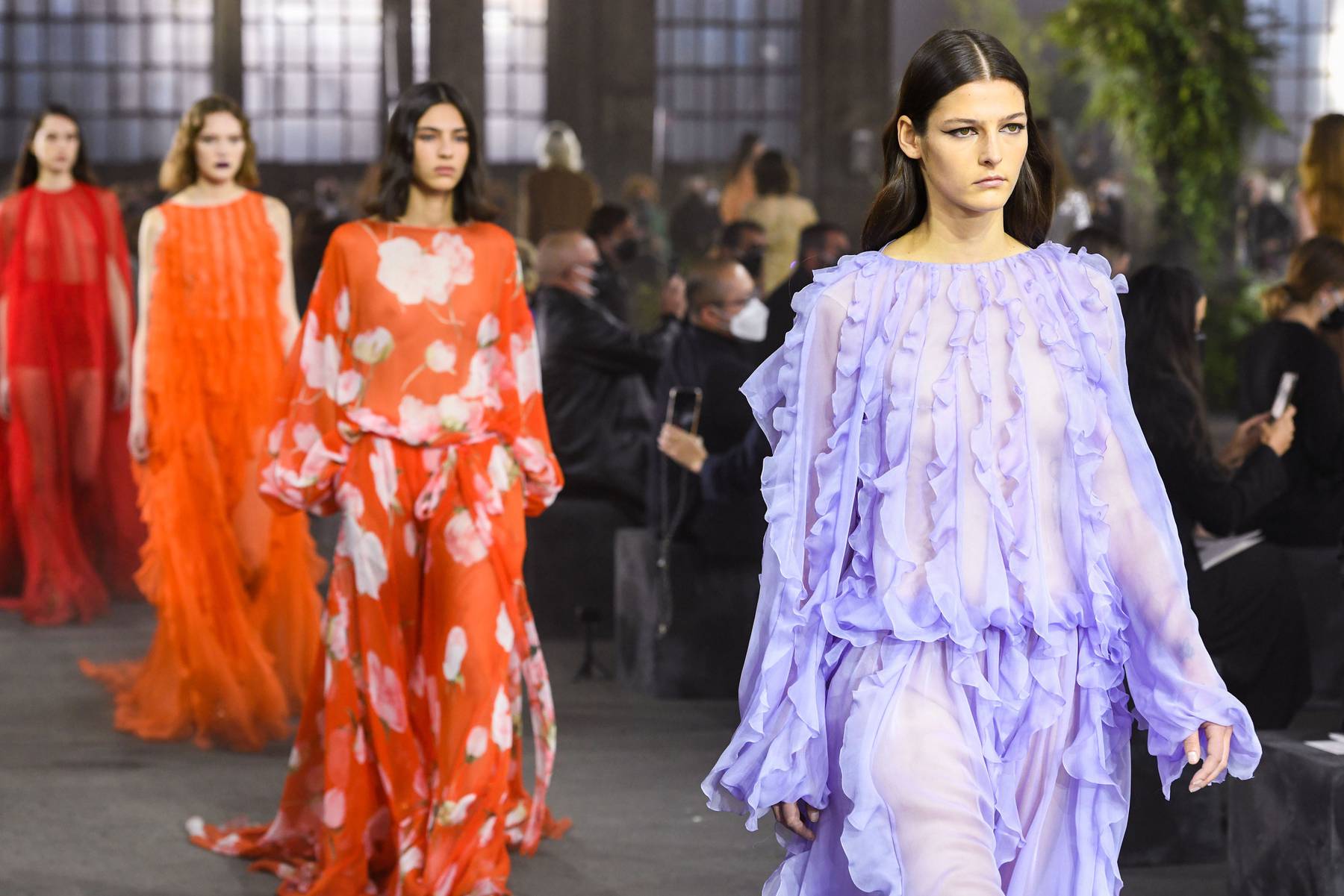 Valentino has been showing in Milan rather than Paris since the pandemic. Models walk the runway in looks from Pierpaolo Piccioli's Spring 2021 collection. Courtesy.