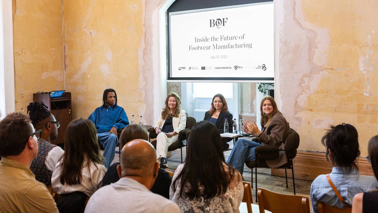 A panel speaking on the topic of the Future of Footwear Manufacturing to an audience at Old Sessions House in London. Panellists from left: Clints' Junior Clint; Maria José Ferreira, head of research and development at the Portuguese Footwear Research and Technical Centre; The Future Laboratory's Marta Indeka; and BoF's Alice Gividen.