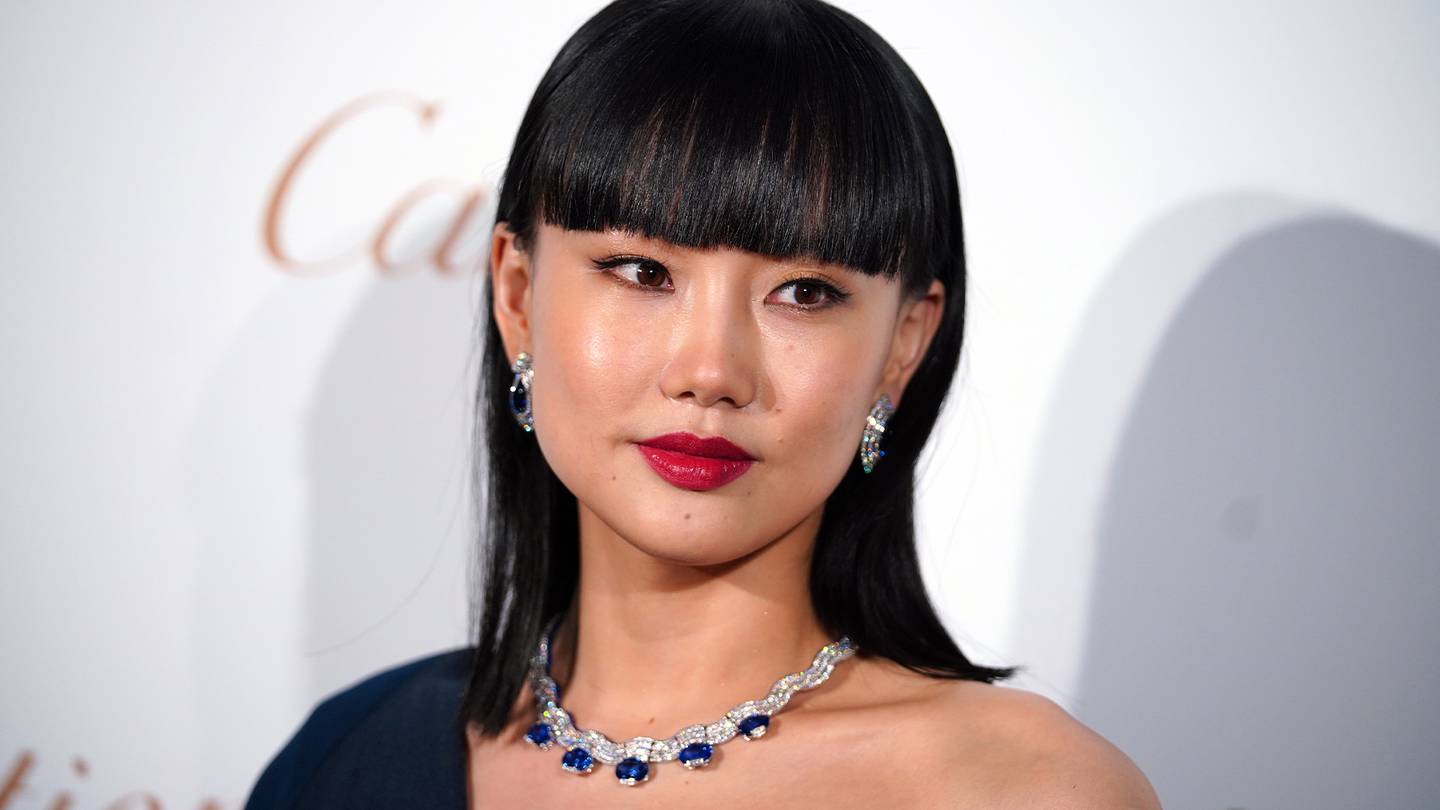 Singer Huang Ling attends opening ceremony of Cartier jewellery exhibition in Shanghai, China. Getty Images.