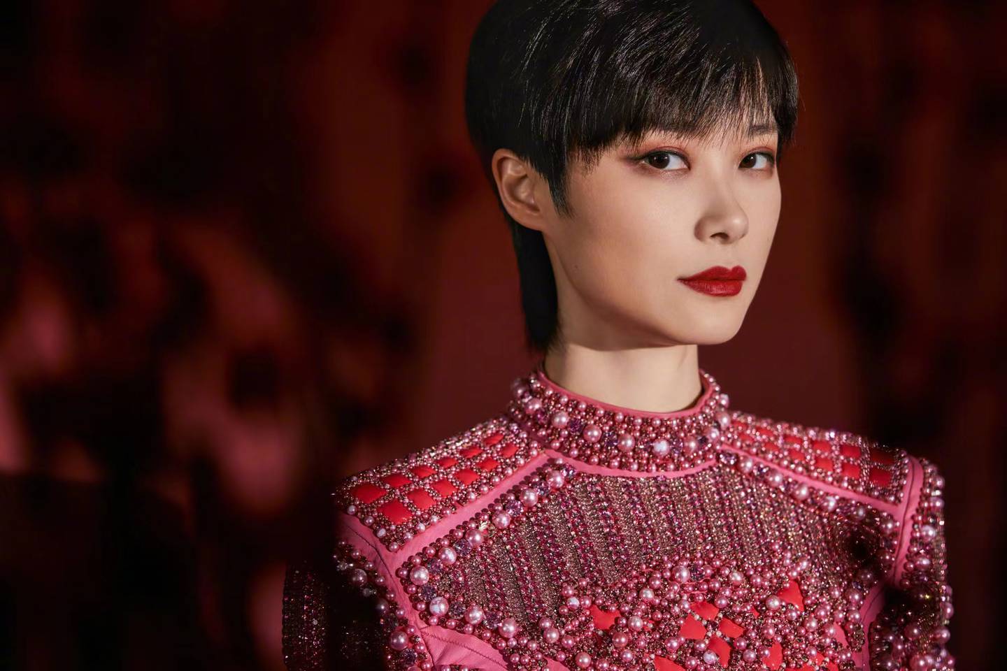 Chinese singer Li Yuchun, also known as Chris Lee, wears a Balmain x Barbie limited edition outfit.