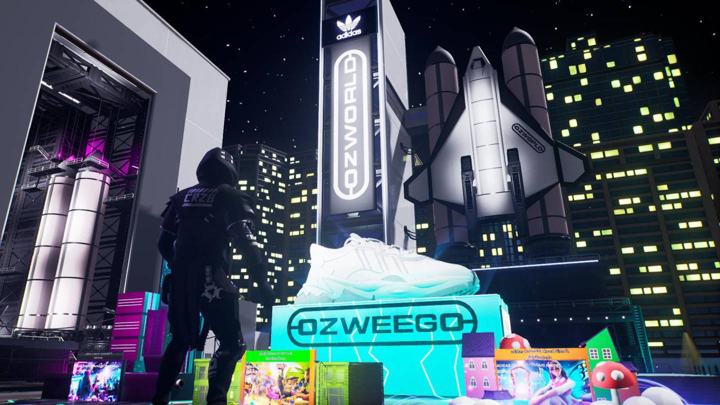 A man in a spacesuit stands in a virtual cityscape where a giant replica of Adidas' Ozweego sneaker is poised in front of a spaceship.