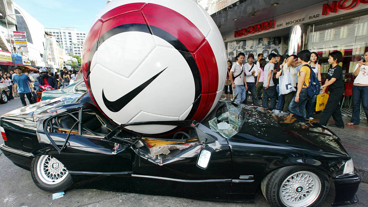 A Nike football crushing a BMW car in Thailand