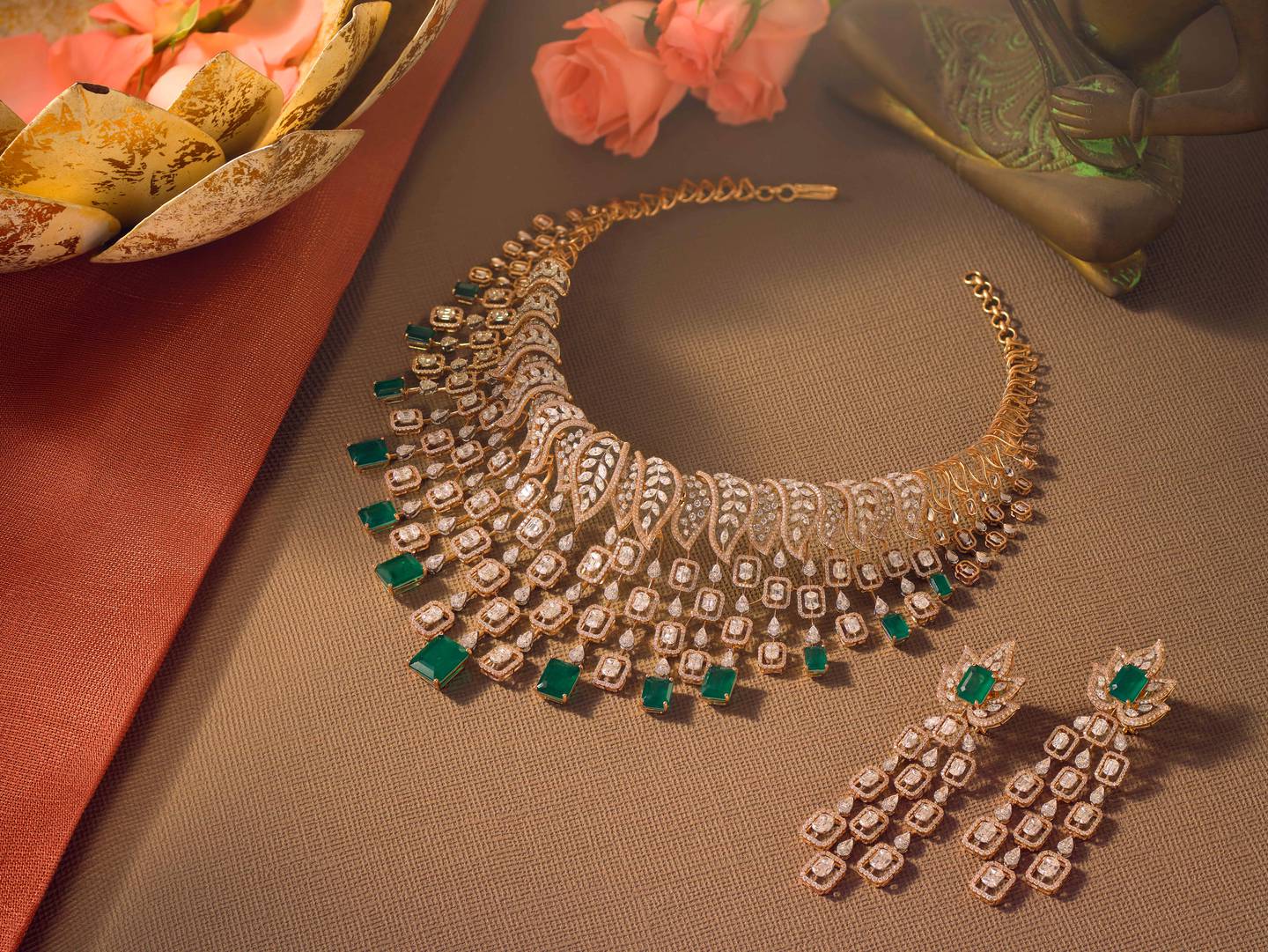 A Malabar Gold & Diamonds diamond necklace with earrings.