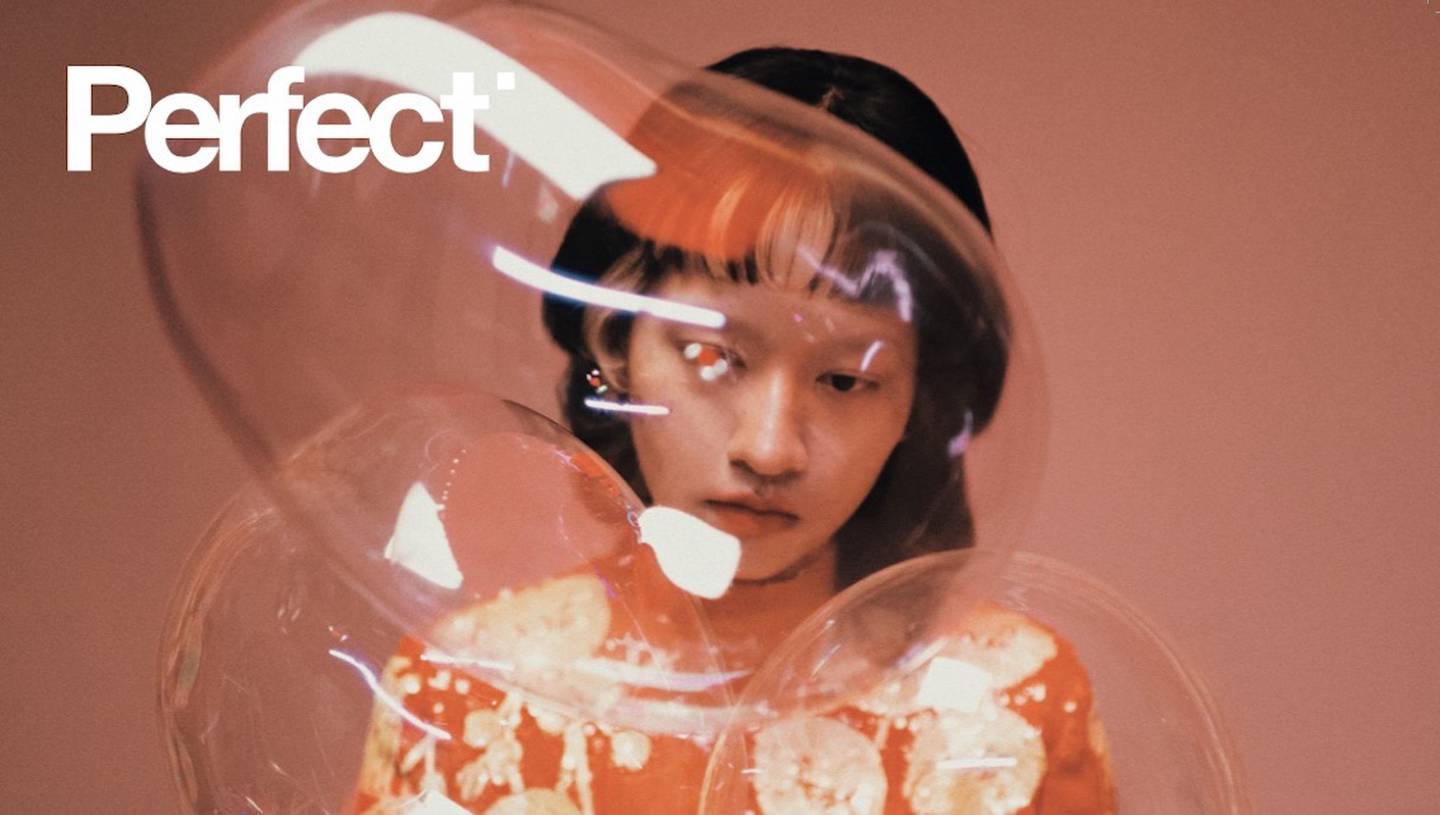 Taiwanese artist Hsien Ching on the cover of Perfect. Perfect