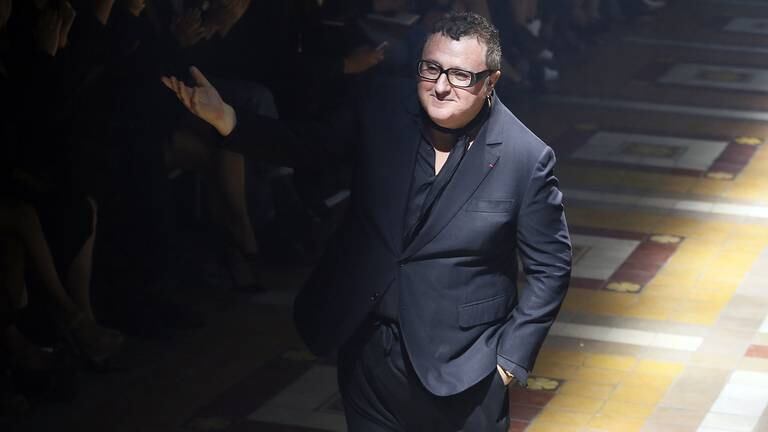 Alber Elbaz acknowledges the audience at the end of the Lanvin 2015 Spring/Summer ready-to-wear collection fashion show. Getty Images.