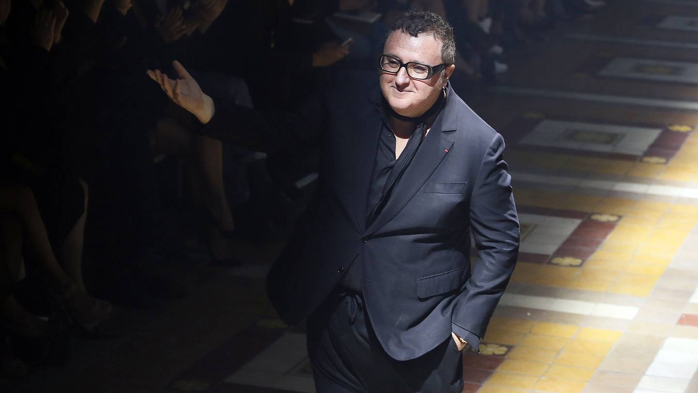 Alber Elbaz acknowledges the audience at the end of the Lanvin 2015 Spring/Summer ready-to-wear collection fashion show. Getty Images.