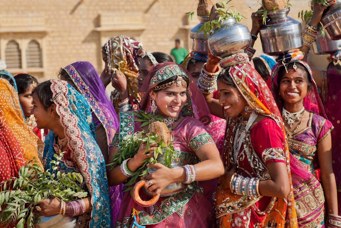 Young women dressed in traditional indian sari at the Desert Festival on March 1, 2015. Shutterstock.