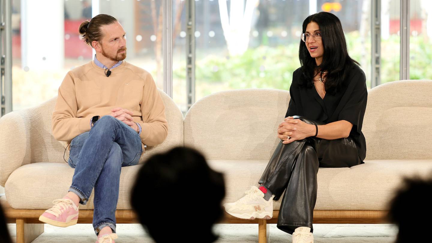 Adam Petrick and Deena Bahri on stage during The BoF Professional Summit.