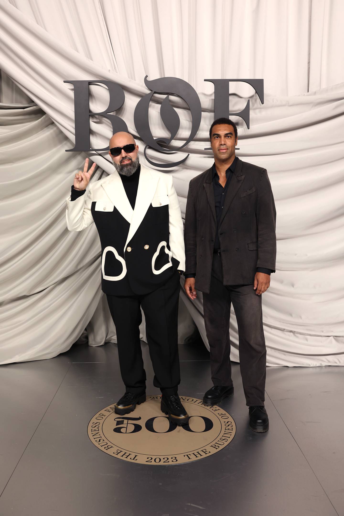 Charaf Tajer and guest attend the #BoF500 Gala during Paris Fashion Week at Shangri-La Hotel Paris on September 30, 2023 in Paris, France.