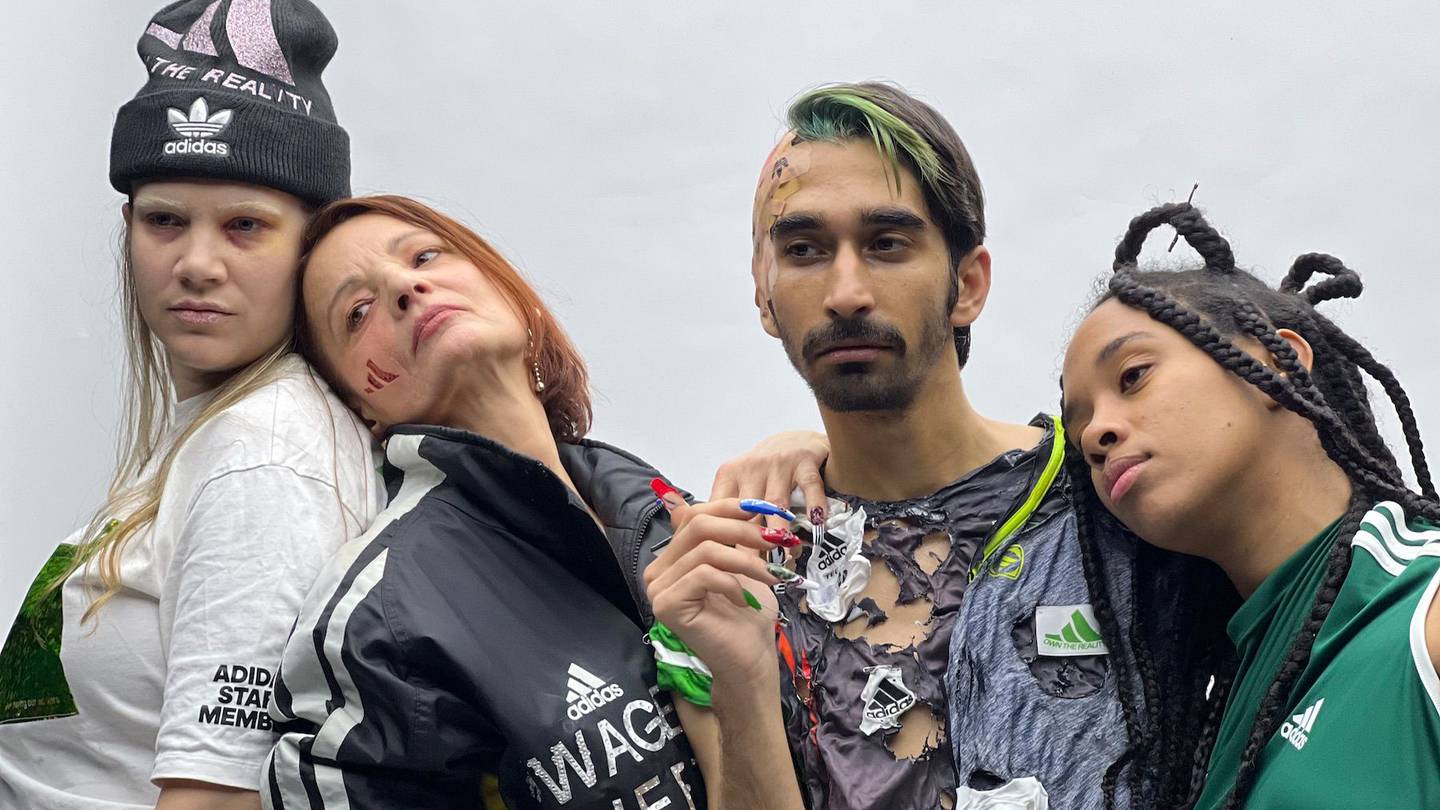Workers’ rights campaigners staged a fake Adidas fashion show during Berlin fashion week to draw attention to alleged rights violations in the brand’s supply chain.