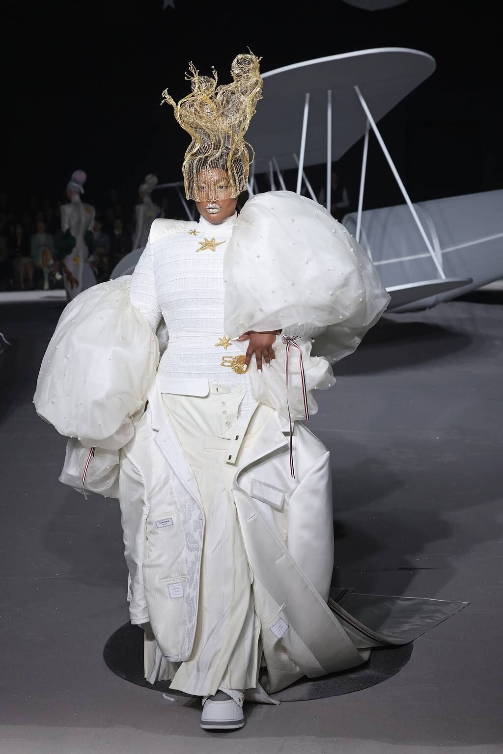 Many observers noted a lack of curve models at NYFW this season. Precious Lee closing Thom Browne's show was an exception.